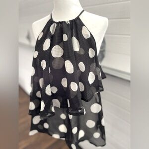 Semi sheer sleeveless blouse